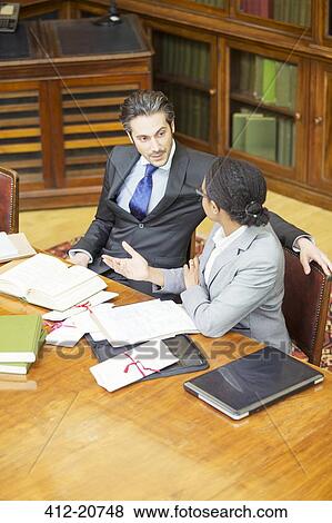 Lawyers talking in chambers View Large Photo Image Stock Photo - Lawyers talking in chambers . Fotosearch