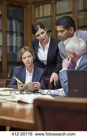 Lawyers talking in chambers View Large Photo Image Stock Photograph - Lawyers talking in chambers. Fotosearch