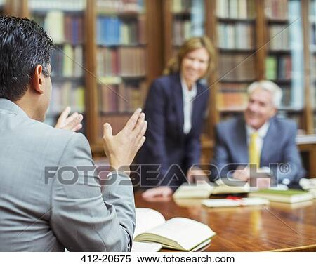 Lawyers talking in chambers View Large Photo Image Stock Photography - Lawyers talking in chambers. Fotosearch