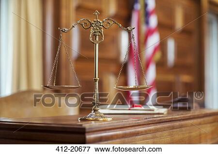 Scales of justice on the judge's bench View Large Photo Image Stock Photo - Scales of justice on the judge's bench. Fotosearch