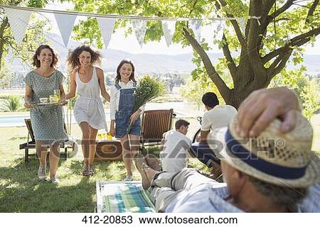 Family enjoying the outdoors together View Large Photo Image Stock Image - Family enjoying the outdoors together. Fotosearch