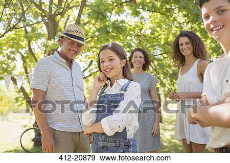Family enjoying the outdoors together View Large Photo Image Stock Photo - Family enjoying the outdoors together . Fotosearch