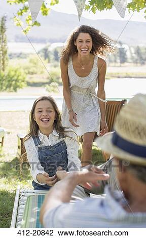 Family playing outdoors View Large Photo Image Stock Image - Family playing outdoors. Fotosearch