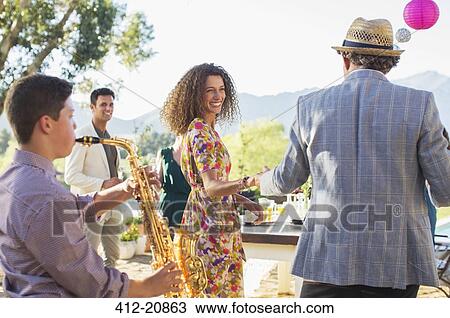 Father and daughter dancing outdoors View Large Photo Image Stock Image - Father and daughter dancing outdoors. Fotosearch