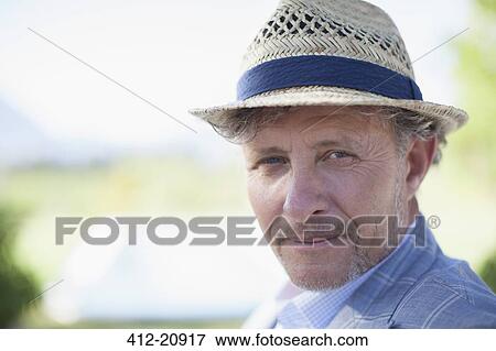 Older man smiling outdoors View Large Photo Image Stock Photo - Older man smiling outdoors. Fotosearch