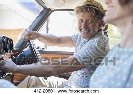 Older man starting car ignition View Large Photo Image Stock Image - Older man starting car ignition . Fotosearch