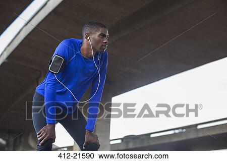 Man resting after exercising View Large Photo Image Stock Image - Man resting after exercising. Fotosearch