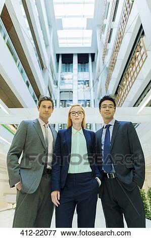 Business people in office building View Large Photo Image Stock Photo - Business people in office building . Fotosearch