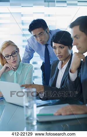 Business people talking in meeting in office building View Large Photo Image Stock Photo - Business people talking in meeting in office building. Fotosearch
