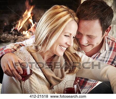Stock Photo - Couple enjoying drinks together. Fotosearch