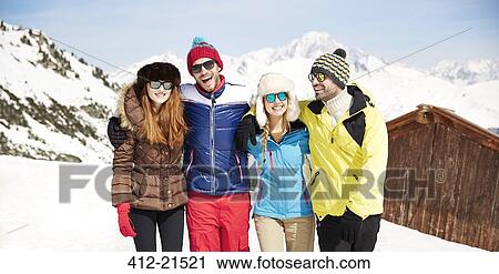 Friends hugging on mountain top View Large Photo Image Stock Image - Friends hugging on mountain top. Fotosearch