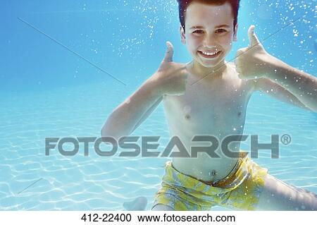 Portrait of boy with thumbs up underwater View Large Photo Image Stock Image - Portrait of boy with thumbs up underwater. Fotosearch