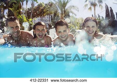 Portrait of family with two children in swimming pool View Large Photo Image Stock Image - Portrait of family with two children in swimming pool. Fotosearch