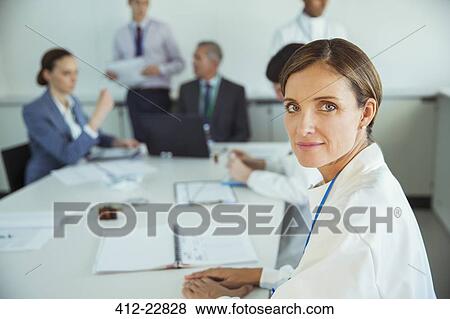 Scientist sitting in meeting View Large Photo Image Stock Photo - Scientist sitting in meeting. Fotosearch