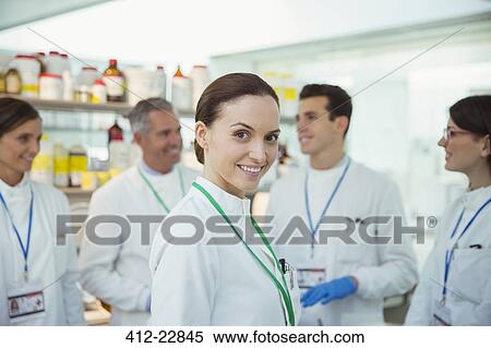 Stock Photography - Scientist smiling in laboratory. Fotosearch