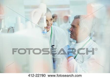 Scientists working in laboratory View Large Photo Image Stock Image - Scientists working in laboratory. Fotosearch