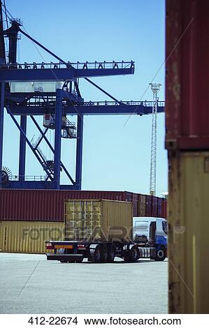 Picture - Truck carrying cargo container. Fotosearch