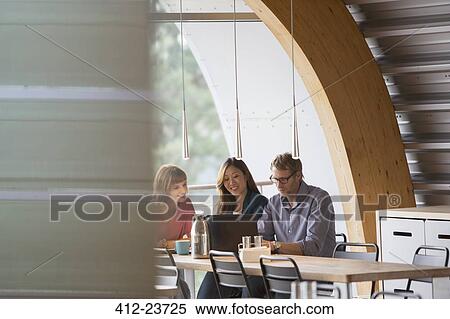Business people talking in cafeteria View Large Photo Image Stock Photography - Business people talking in cafeteria. Fotosearch