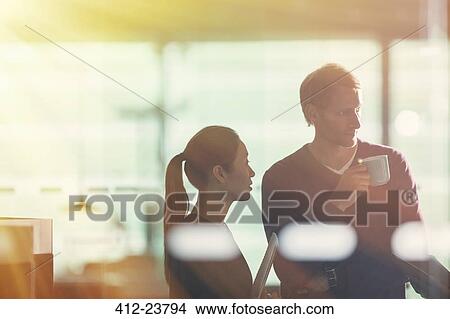 Business people talking in office View Large Photo Image Picture - Business people talking in office. Fotosearch
