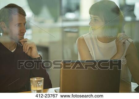 Business people talking in office meeting View Large Photo Image Stock Photo - Business people talking in office meeting. Fotosearch