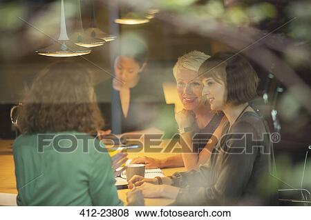 Business people talking in office meeting View Large Photo Image Stock Photo - Business people talking in office meeting. Fotosearch