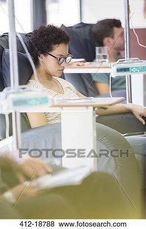 Patients receiving intravenous infusion in hospital View Large Photo Image Stock Photo - Patients receiving intravenous infusion in hospital. Fotosearch