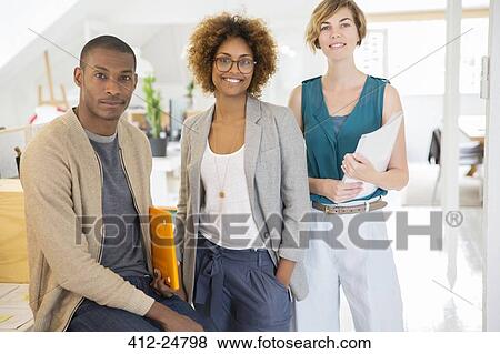 Portrait of smiling office workers View Large Photo Image Stock Photo - Portrait of smiling office workers. Fotosearch