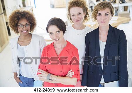 Portrait of smiling office workers View Large Photo Image Stock Photo - Portrait of smiling office workers. Fotosearch