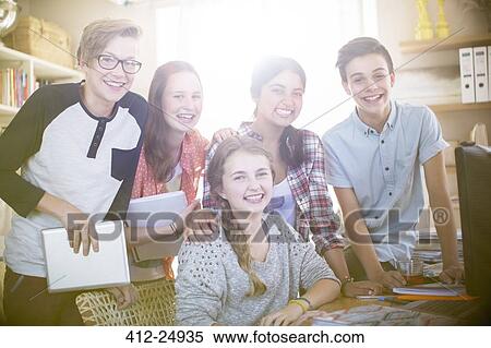 Group portrait of smiling teenagers at home View Large Photo Image Stock Photography - Group portrait of smiling teenagers at home. Fotosearch
