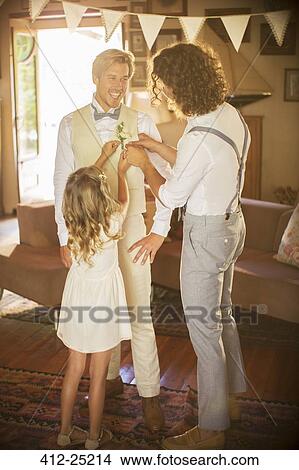 Bridegroom and best man preparing for wedding ceremony View Large Photo Image Picture - Bridegroom and best man preparing for wedding ceremony. Fotosearch