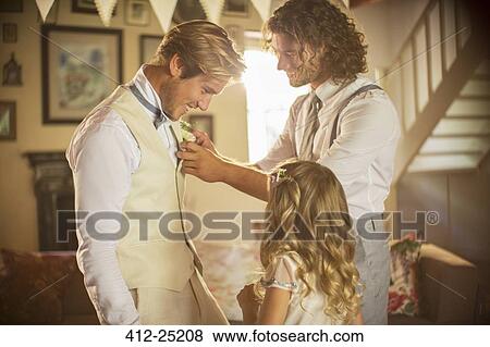 Bridegroom and best man preparing for wedding ceremony View Large Photo Image Stock Photo - Bridegroom and best man preparing for wedding ceremony. Fotosearch