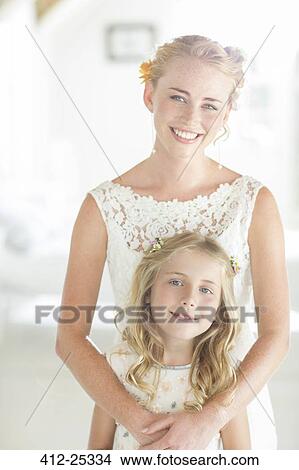 Portrait of bride and bridesmaid in domestic room View Large Photo Image Picture - Portrait of bride and bridesmaid in domestic room. Fotosearch