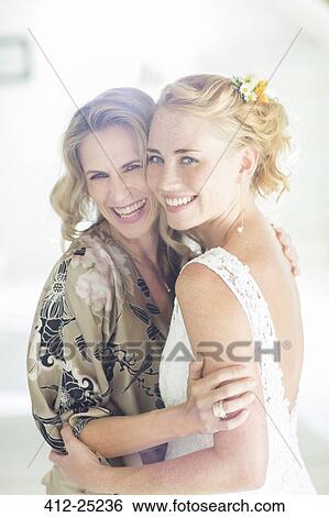 Portrait of bride and matron of honor at wedding reception View Large Photo Image Stock Photograph - Portrait of bride and matron of honor at wedding reception. Fotosearch