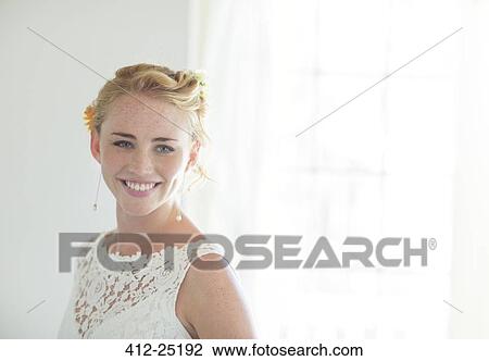 Portrait of smiling bride in sunny room View Large Photo Image Stock Image - Portrait of smiling bride in sunny room. Fotosearch