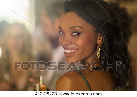 Portrait of young smiling woman at wedding reception View Large Photo Image Stock Image - Portrait of young smiling woman at wedding reception. Fotosearch