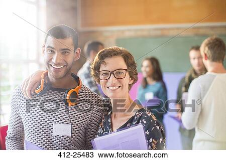 Portrait of smiling people at seminar View Large Photo Image Stock Image - Portrait of smiling people at seminar. Fotosearch