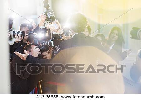 Celebrity being photographed by paparazzi at event View Large Photo Image Stock Photography - Celebrity being photographed by paparazzi at event. Fotosearch