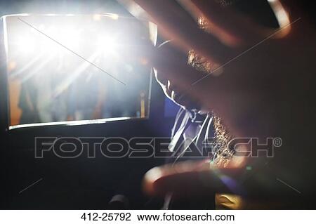 Celebrity couple blocking camera in limousine at event View Large Photo Image Stock Image - Celebrity couple blocking camera in limousine at event. Fotosearch