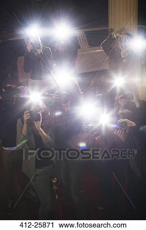 Paparazzi photographers at red carpet event View Large Photo Image Stock Image - Paparazzi photographers at red carpet event. Fotosearch