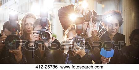 Portrait of paparazzi in a row with cameras and microphone View Large Photo Image Stock Photograph - Portrait of paparazzi in a row with cameras and microphone. Fotosearch