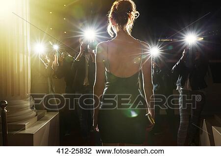 Silhouette of celebrity in black dress being photographed by paparazzi View Large Photo Image Stock Image - Silhouette of celebrity in black dress being photographed by paparazzi. Fotosearch