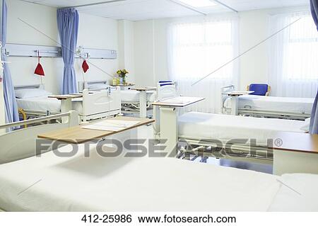 Beds ready in empty hospital room View Large Photo Image Stock Photograph - Beds ready in empty hospital room. Fotosearch
