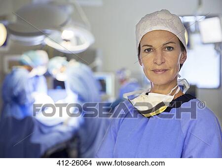 Portrait of confident surgeon in operating room View Large Photo Image Picture - Portrait of confident surgeon in operating room. Fotosearch