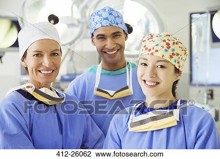 Portrait of smiling surgeons View Large Photo Image Stock Image - Portrait of smiling surgeons. Fotosearch
