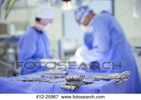 Surgical scissors on tray in operating room View Large Photo Image Stock Photo - Surgical scissors on tray in operating room. Fotosearch
