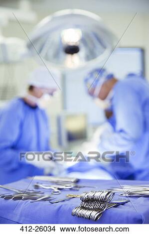 Surgical tools on tray in operating room View Large Photo Image Picture - Surgical tools on tray in operating room. Fotosearch