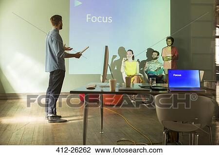 Business people preparing audio visual presentation on Focus View Large Photo Image Stock Image - Business people preparing audio visual presentation on Focus. Fotosearch