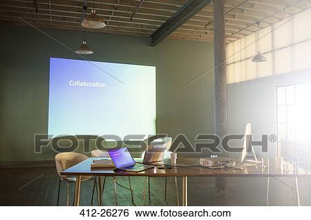 Stock Photograph - Collaboration text on audio visual presentation screen. Fotosearch