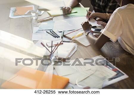 Creative business people brainstorming in meeting View Large Photo Image Stock Photography - Creative business people brainstorming in meeting. Fotosearch