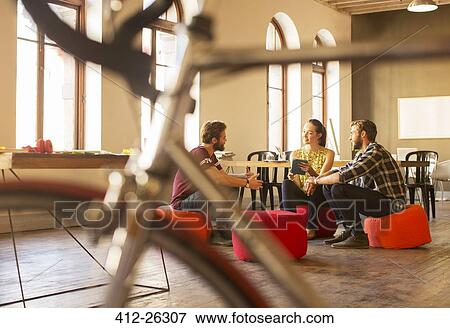 Creative business people meeting with digital tablet in office View Large Photo Image Stock Photo - Creative business people meeting with digital tablet in office. Fotosearch